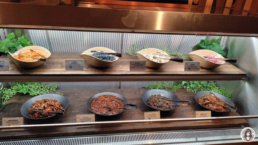 海と灯夕食ビュッフェ、各種漬物、蟹味噌、小茄子、大根の松前漬け、三升漬け、めかぶの松前漬け、烏賊刺し松前など